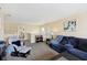 Cozy loft area with comfortable seating, neutral color walls, and carpeted floors at 11624 Eldridge Dr, Indianapolis, IN 46235