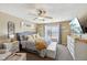 Inviting main bedroom featuring a ceiling fan, a large bed, with a window at 11624 Eldridge Dr, Indianapolis, IN 46235
