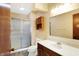 Updated bathroom with a glass-enclosed shower, vanity with mirror, and modern fixtures at 12 Danridge Dr, Danville, IN 46122