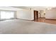Open concept living space with hardwood flooring and a large window for natural light at 12 Danridge Dr, Danville, IN 46122