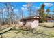 A view of a detached storage shed with a window at 12 Danridge Dr, Danville, IN 46122