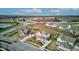 Beautiful aerial view of homes in a quiet community, featuring manicured lawns and roundabout street design at 12073 Springtide Ln, Fishers, IN 46037