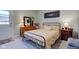 Cozy bedroom with a metal bed frame, soft lighting, and neutral color palette at 12073 Springtide Ln, Fishers, IN 46037