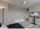 Spacious bedroom with modern lamp and TV at 12073 Springtide Ln, Fishers, IN 46037