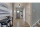 Welcoming foyer with hardwood floors and a view of the staircase at 12073 Springtide Ln, Fishers, IN 46037