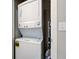 Convenient laundry area with stacked washer and dryer in a closet at 12073 Springtide Ln, Fishers, IN 46037