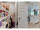 Organized pantry with wire shelving near the kitchen with cleaning supplies for easy home maintenance at 12073 Springtide Ln, Fishers, IN 46037