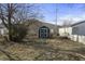 Backyard of the home showing a small shed at 1211 W 30Th St, Indianapolis, IN 46208