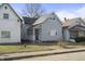 Charming home with a light gray exterior, featuring a screened porch at 1211 W 30Th St, Indianapolis, IN 46208