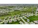 Expansive aerial view showcasing a meticulously planned community with lush greenery and winding pathways at 12127 Whisper Ridge Dr, Noblesville, IN 46060