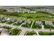 An aerial view of a new housing community with sidewalks and walking trails at 12127 Whisper Ridge Dr, Noblesville, IN 46060