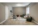 A finished basement provides extra living space with plush carpeting and natural light from a window at 12127 Whisper Ridge Dr, Noblesville, IN 46060