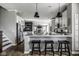 Spacious kitchen with a center island, stainless steel appliances, and modern finishes at 12127 Whisper Ridge Dr, Noblesville, IN 46060