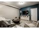 Cozy living room featuring a comfortable sofa, entertainment center, and stylish decor at 12127 Whisper Ridge Dr, Noblesville, IN 46060
