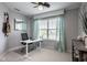 Bright office space featuring a modern desk, comfortable chair, and serene outdoor views at 12127 Whisper Ridge Dr, Noblesville, IN 46060