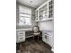 Bright office space with custom built-in cabinetry and granite countertops at 12127 Whisper Ridge Dr, Noblesville, IN 46060