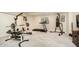Basement gym equipped with weight bench, treadmill, and punching bag, providing a complete workout area at 12433 Harvest Glen Blvd, Fishers, IN 46037