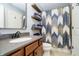 This bathroom features rustic floating shelves at 12433 Harvest Glen Blvd, Fishers, IN 46037