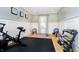 A well-lit exercise room with modern equipment, neutral walls, and clean flooring at 12433 Harvest Glen Blvd, Fishers, IN 46037