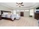 Relaxing main bedroom with lots of natural light, a ceiling fan, and a tray ceiling at 12433 Harvest Glen Blvd, Fishers, IN 46037