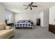 Large main bedroom with natural light, a king bed, and ample space for relaxation at 1399 Hat Band St, Danville, IN 46122
