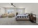 Bright main bedroom with natural light, a king bed, and cozy seating, offering a peaceful retreat at 1399 Hat Band St, Danville, IN 46122