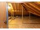 Unfinished attic with exposed wood beams, and plywood subflooring at 154 Dover N Blvd, Brownsburg, IN 46112