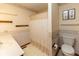 Neutral bathroom featuring a shower/tub combo with coordinated accents and flooring at 154 Dover N Blvd, Brownsburg, IN 46112