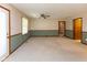 Spacious living room with chair railing and neutral carpet at 154 Dover N Blvd, Brownsburg, IN 46112