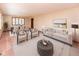 Living room and dining room with neutral tones, plush seating, and ample natural light at 154 Dover N Blvd, Brownsburg, IN 46112