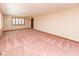 Large living room featuring a spacious open layout, with large windows at 154 Dover N Blvd, Brownsburg, IN 46112