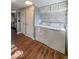 Bright laundry room with wood look floors at 1830 N Livingston Ave, Indianapolis, IN 46222