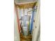 Water heater system shows copper and PVC pipes and a gray Richmond tank at 1830 N Livingston Ave, Indianapolis, IN 46222