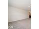 A view of the carpeted floor plan of a bright bedroom with light walls at 2290 Oakmont Dr, Plainfield, IN 46168