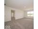 Bright bedroom featuring a large window overlooking a scenic view at 2290 Oakmont Dr, Plainfield, IN 46168