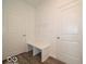 Mudroom area with built-in bench, hooks, and closet at 2290 Oakmont Dr, Plainfield, IN 46168
