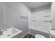 Bathroom featuring a shower and tub combo with vinyl surround, gray paint, and modern fixtures at 2315 Caldwell Pl, Columbus, IN 47201
