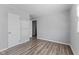 Bedroom featuring modern wood-look flooring and neutral paint at 2315 Caldwell Pl, Columbus, IN 47201