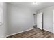 Bedroom with wood-look floors, neutral paint, and plenty of natural light at 2315 Caldwell Pl, Columbus, IN 47201