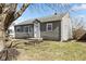 Charming home exterior features light gray siding, a front yard, and inviting entryway at 2315 Caldwell Pl, Columbus, IN 47201
