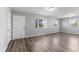 Spacious living room with wood-look floors and plenty of natural light at 2315 Caldwell Pl, Columbus, IN 47201