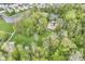A beautiful aerial view of a wooded neighborhood with a playground and green spaces at 2992 Sentiment Ln, Greenwood, IN 46143