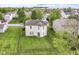 Aerial view of home featuring a spacious backyard with well-kept lawn and black metal fence at 2992 Sentiment Ln, Greenwood, IN 46143