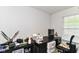 Bedroom featuring a dark desk area near a window at 2992 Sentiment Ln, Greenwood, IN 46143