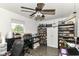 Bedroom featuring a ceiling fan, window, and shelving units at 2992 Sentiment Ln, Greenwood, IN 46143