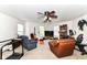 Bonus room featuring neutral walls, ceiling fan, and furniture set at 2992 Sentiment Ln, Greenwood, IN 46143