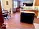 Kitchen with island, stainless steel appliances, and a dining area at 2992 Sentiment Ln, Greenwood, IN 46143