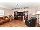 Comfortable living room with a flat-screen TV and hardwood floors at 2992 Sentiment Ln, Greenwood, IN 46143
