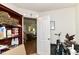 Storage room with an open door shows a glimpse into the living room at 2992 Sentiment Ln, Greenwood, IN 46143