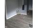 Shows a corner with two bicycle wheels in a damaged home at 335 S Dearborn St, Indianapolis, IN 46201